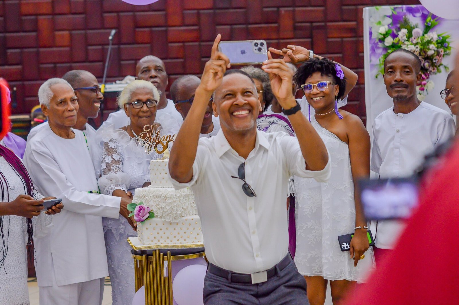 Family taking a selfie at Juliana's 90th birthday