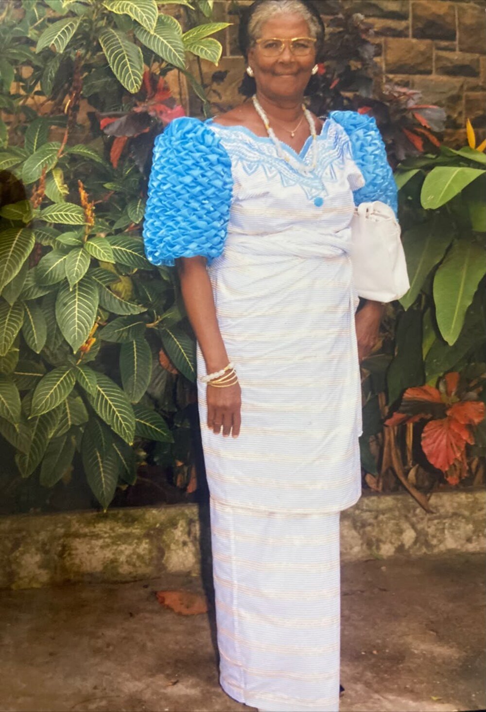 Juliana standing in the garden